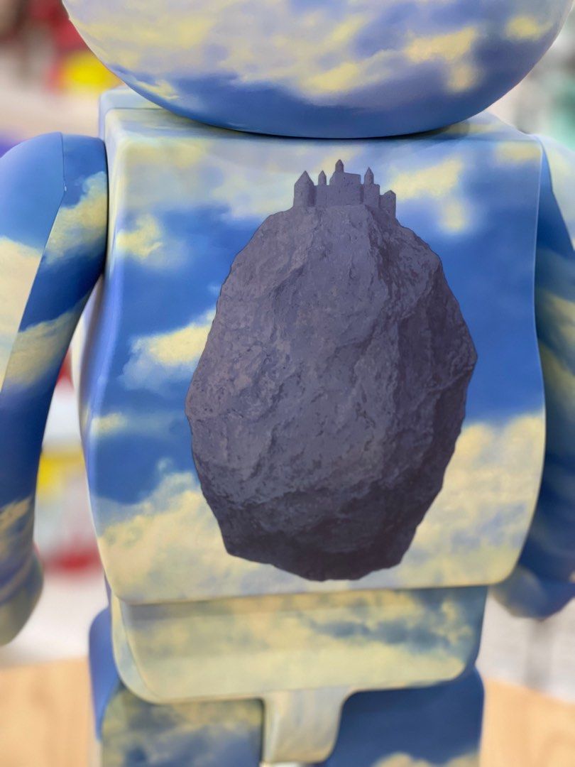 BE@RBRICK x Rene Magritte Infinite Recognition 1963 The Castle of the Pyrenees 1000% bearbrick blue sky
